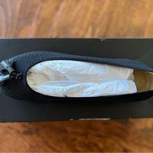 black flats with tassel